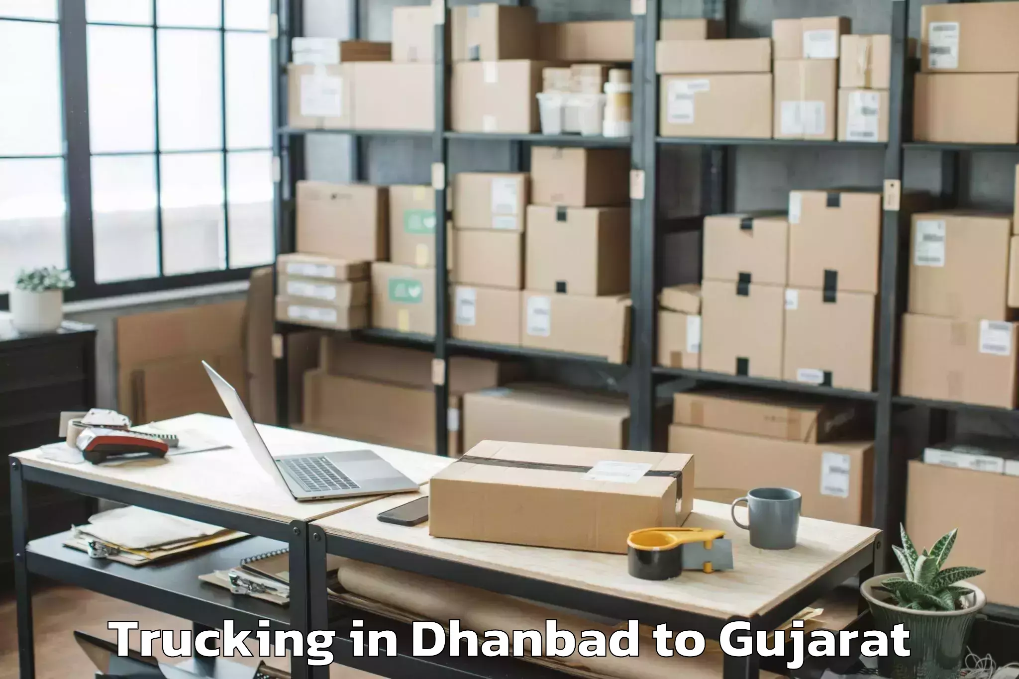 Easy Dhanbad to Rudramata Trucking Booking